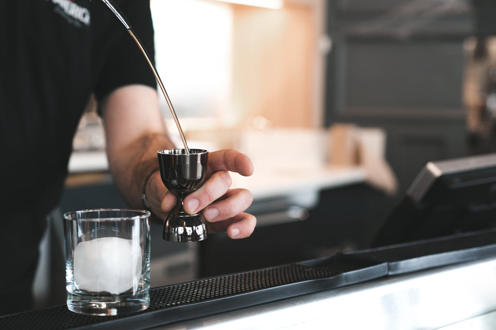 A carefully prepared drink at the bar